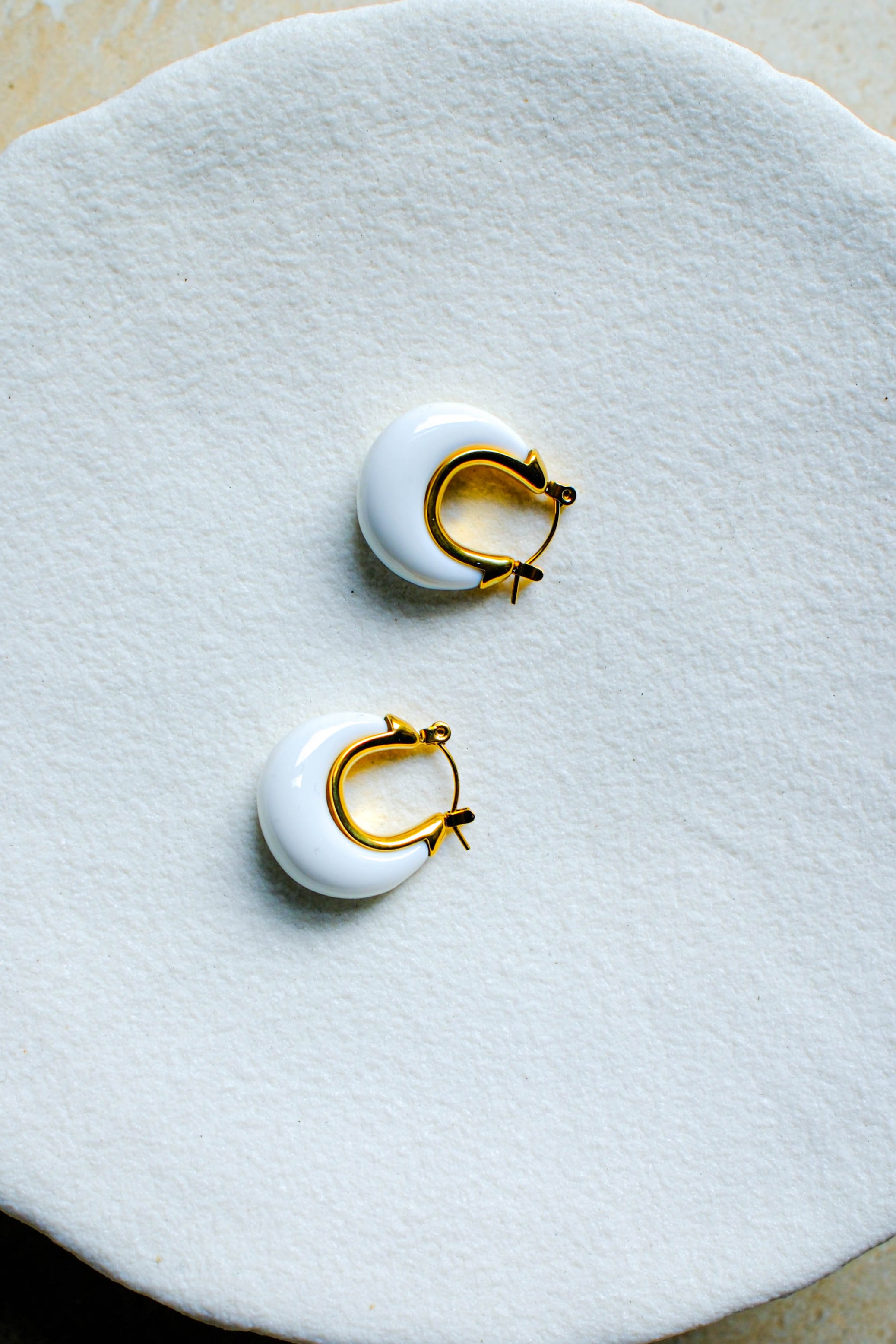 White earrings