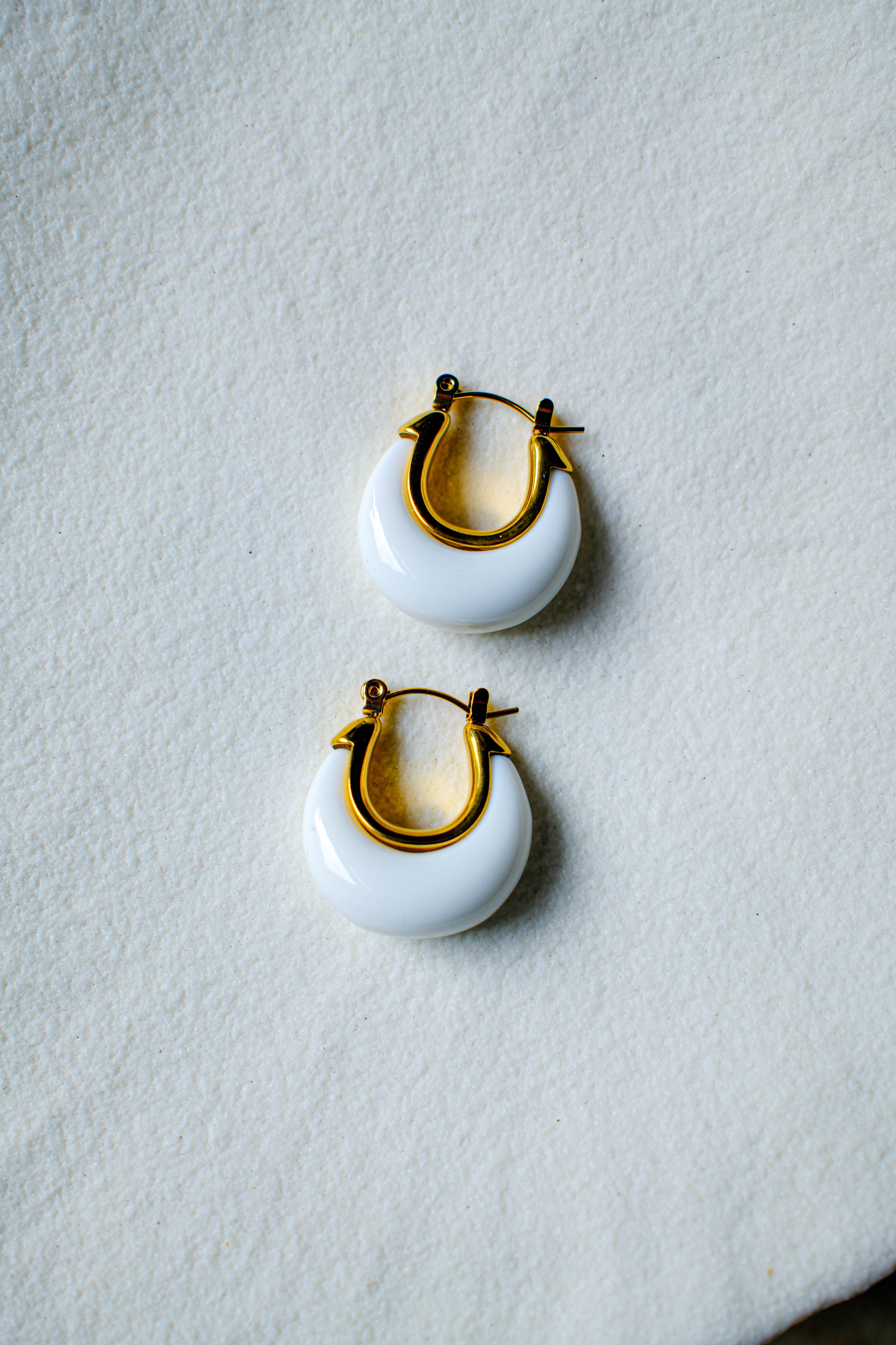 White earrings