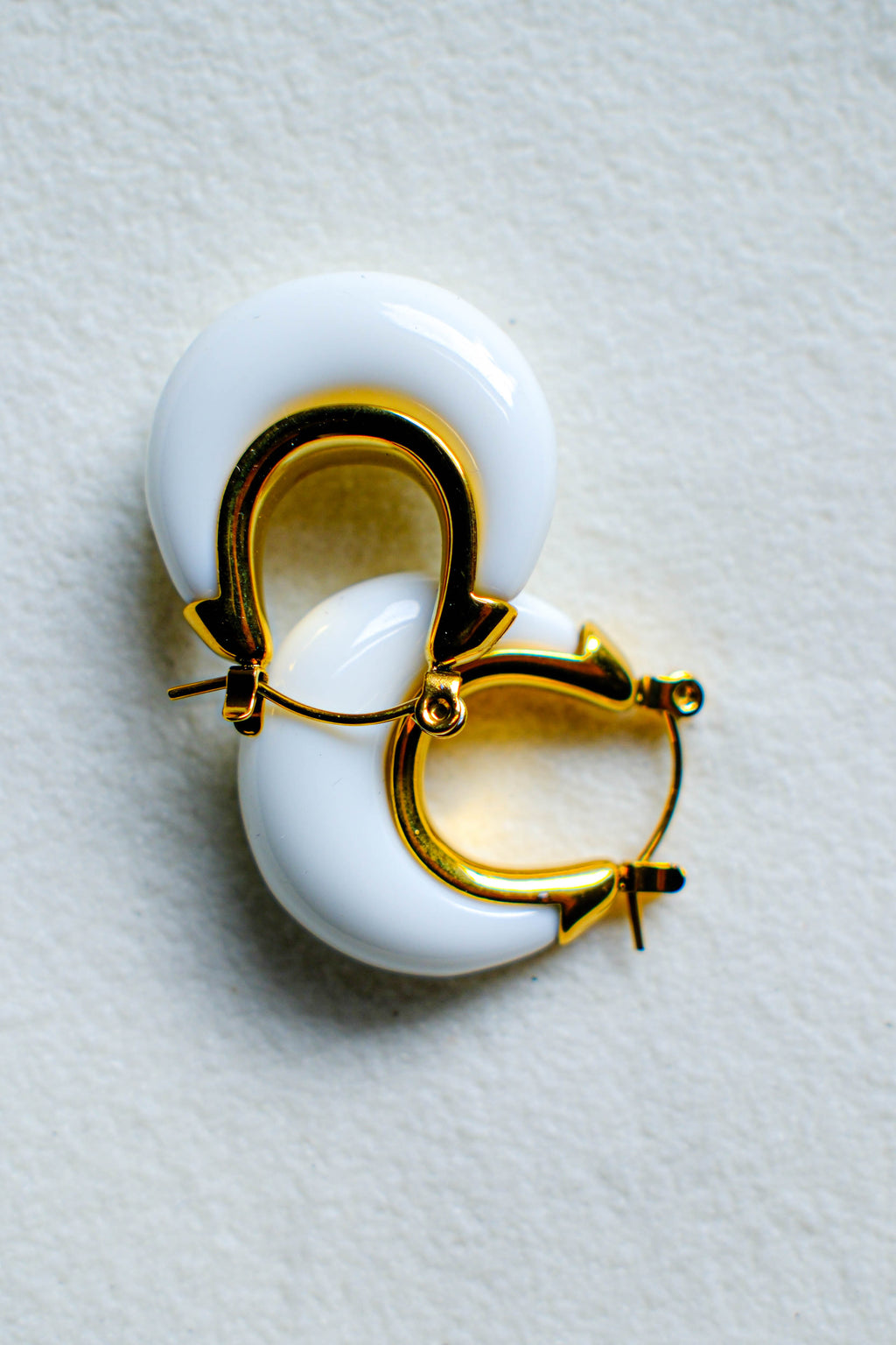 White earrings